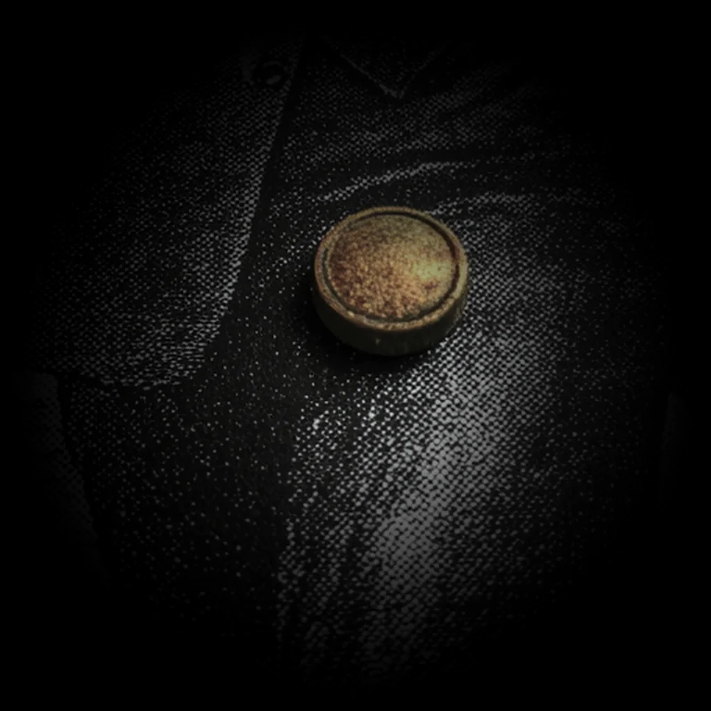 Extreme close-up of a brass shell casing in a dark setting, selective amber-brass spot color.